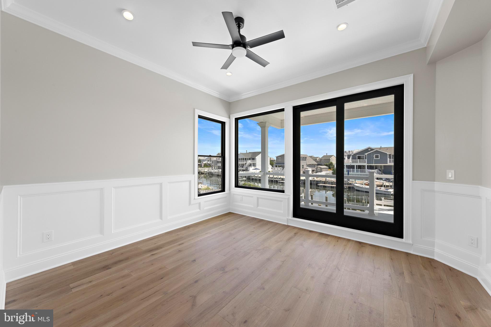 17 Butler Road Long Beach Township, NJ 08006 - Photo 50 of 110 wooden floor in an empty room with a window