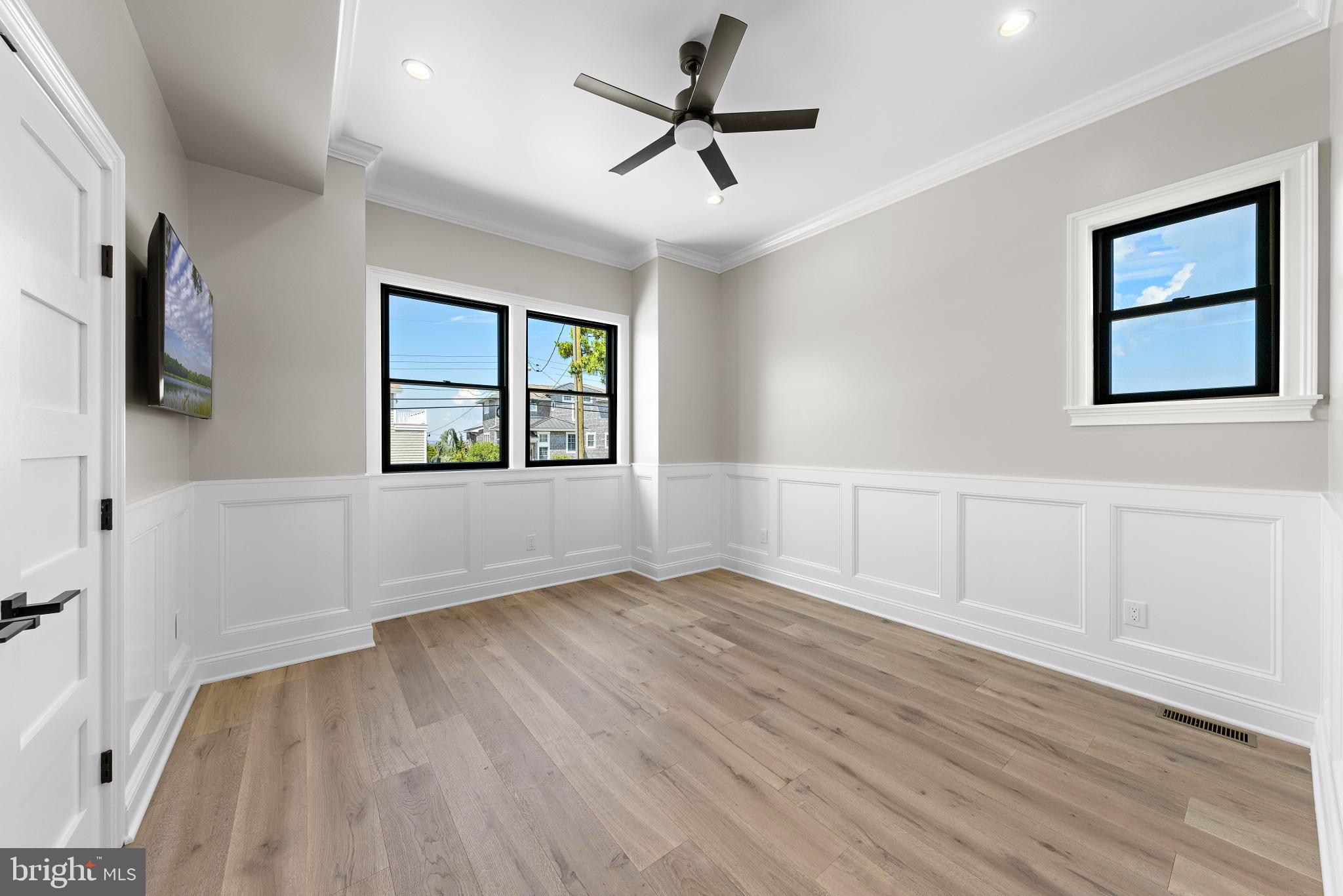 17 Butler Road Long Beach Township, NJ 08006 - Photo 54 of 110 wooden floor in an empty room with a window