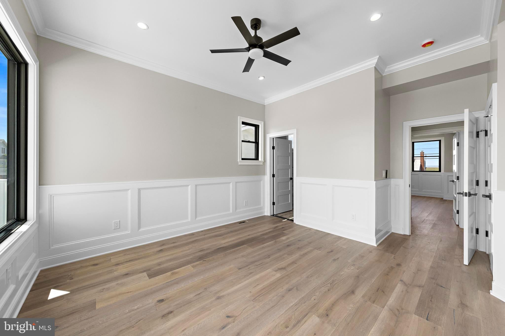17 Butler Road Long Beach Township, NJ 08006 - Photo 59 of 110 wooden floor in an empty room with a window