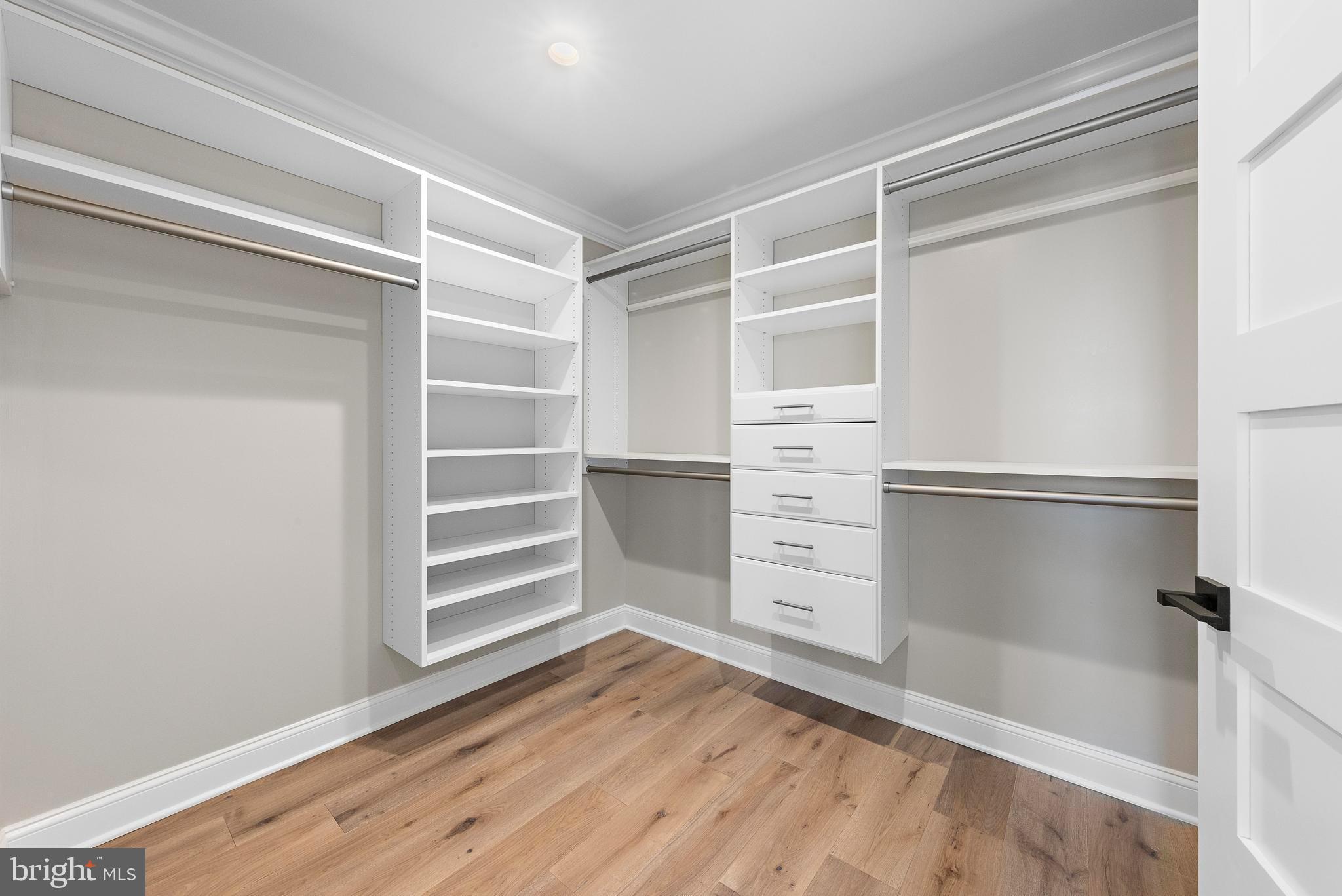 17 Butler Road Long Beach Township, NJ 08006 - Photo 63 of 110 a view of walk in closet with empty racks