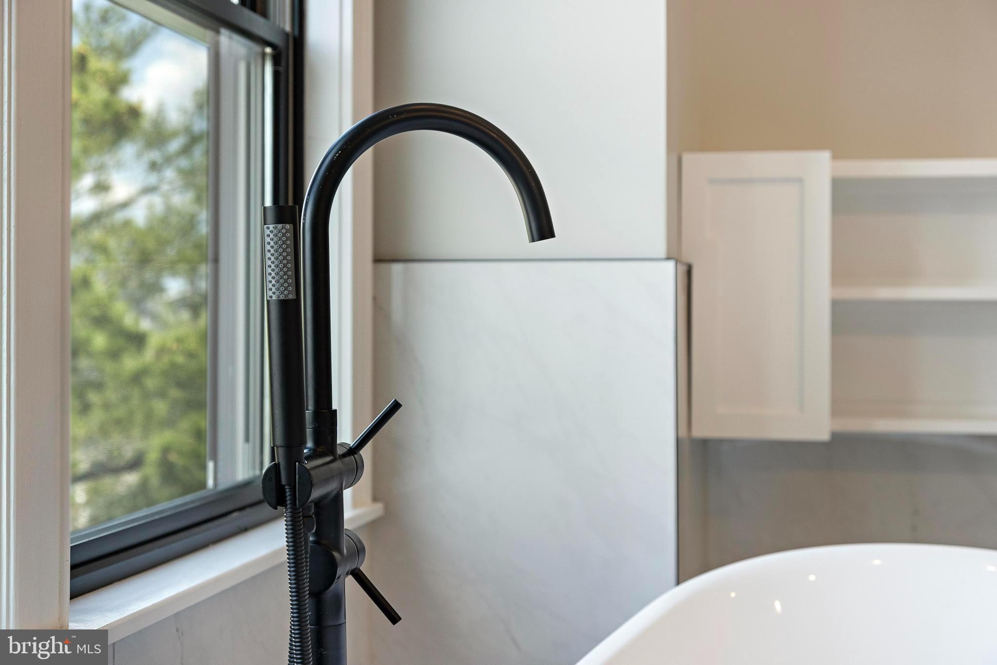 17 Butler Road Long Beach Township, NJ 08006 - Photo 72 of 110 a close view of a bathroom sink and a window
