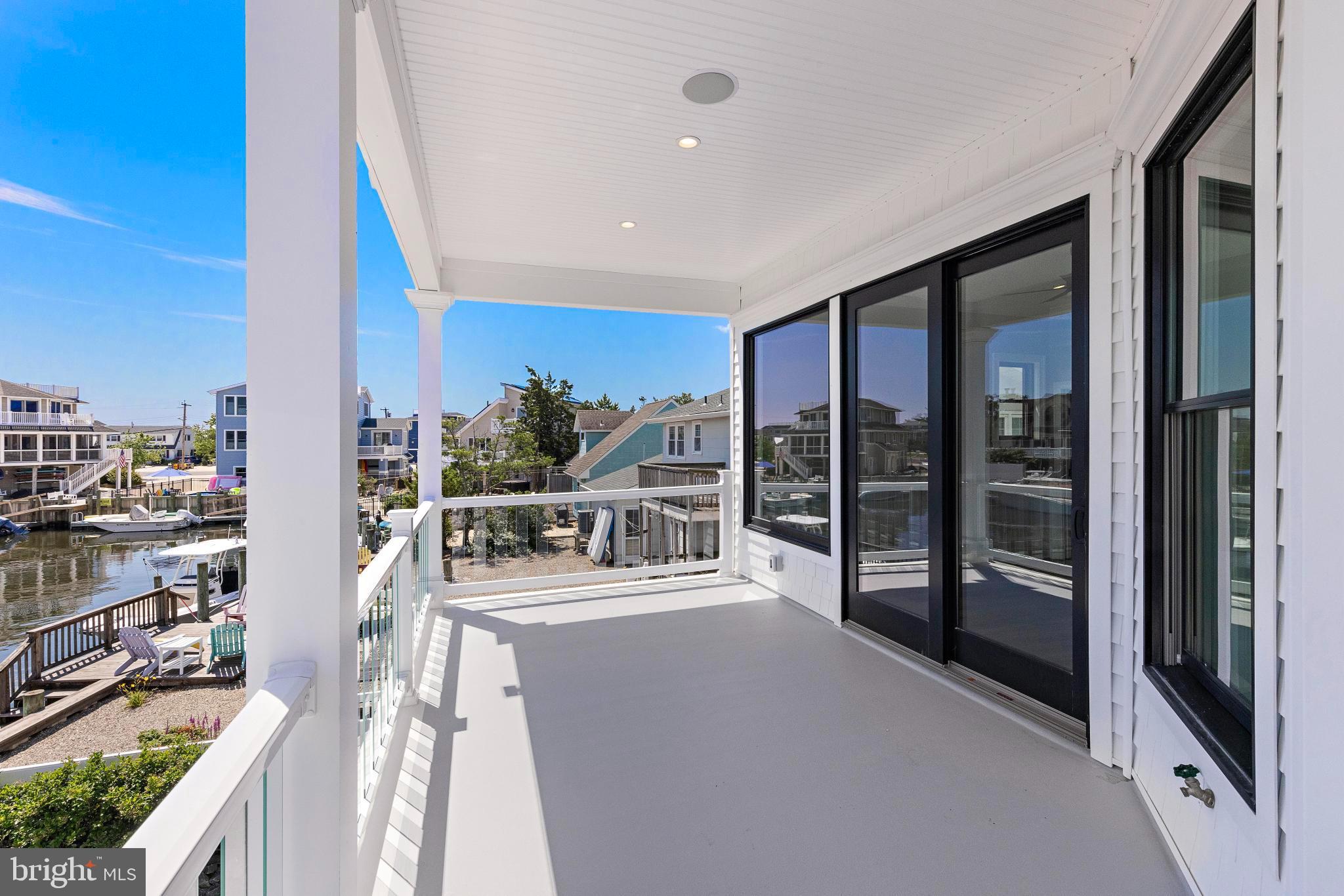 17 Butler Road Long Beach Township, NJ 08006 - Photo 88 of 110 a view of a kitchen with stainless steel appliances kitchen island granite countertop a refrigerator and a counter top space