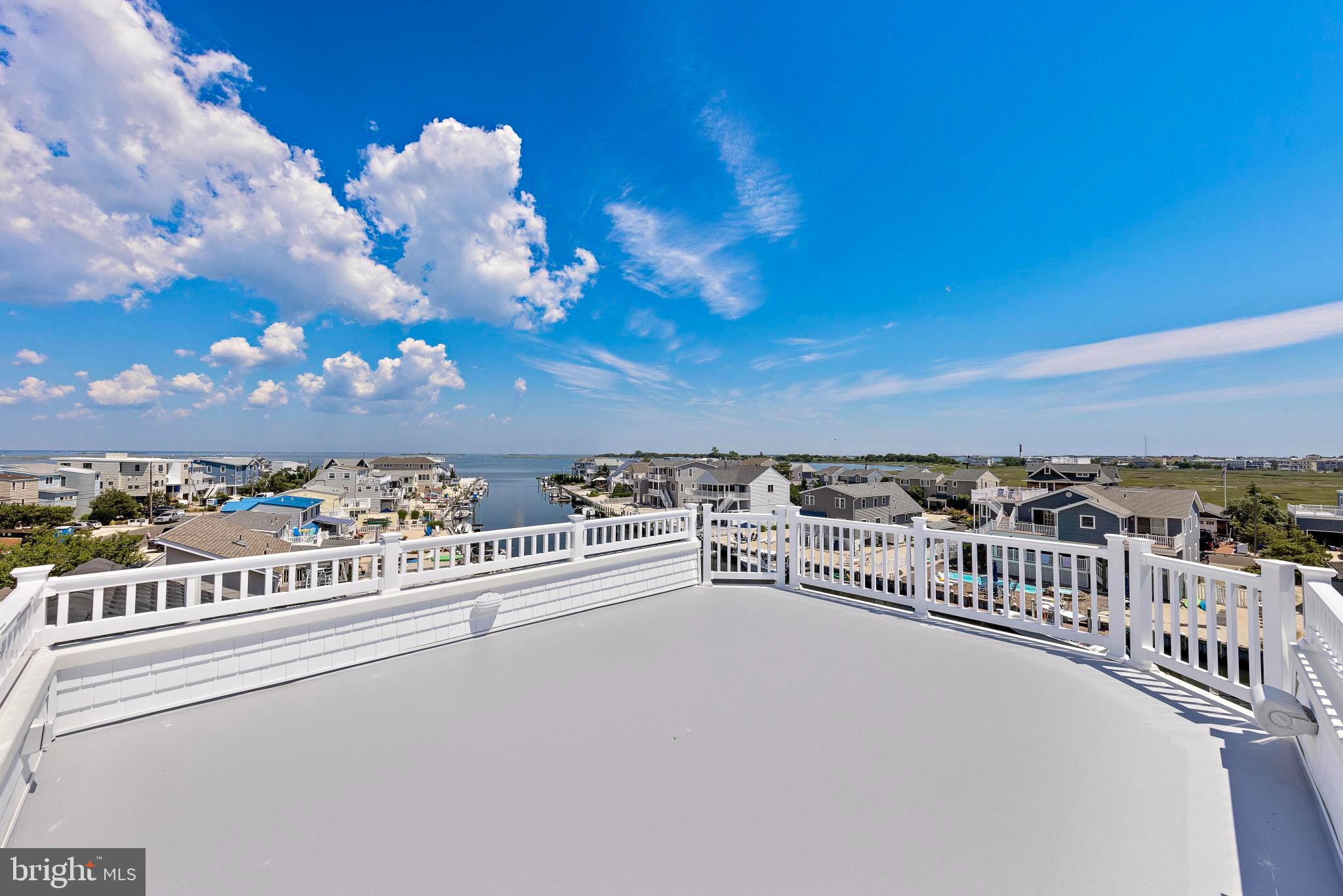 17 Butler Road Long Beach Township, NJ 08006 - Photo 94 of 110 a view of a balcony with city view