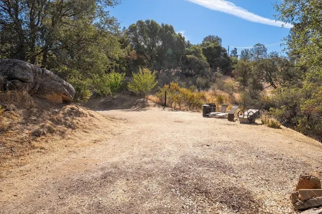 a view of a yard covered with snow