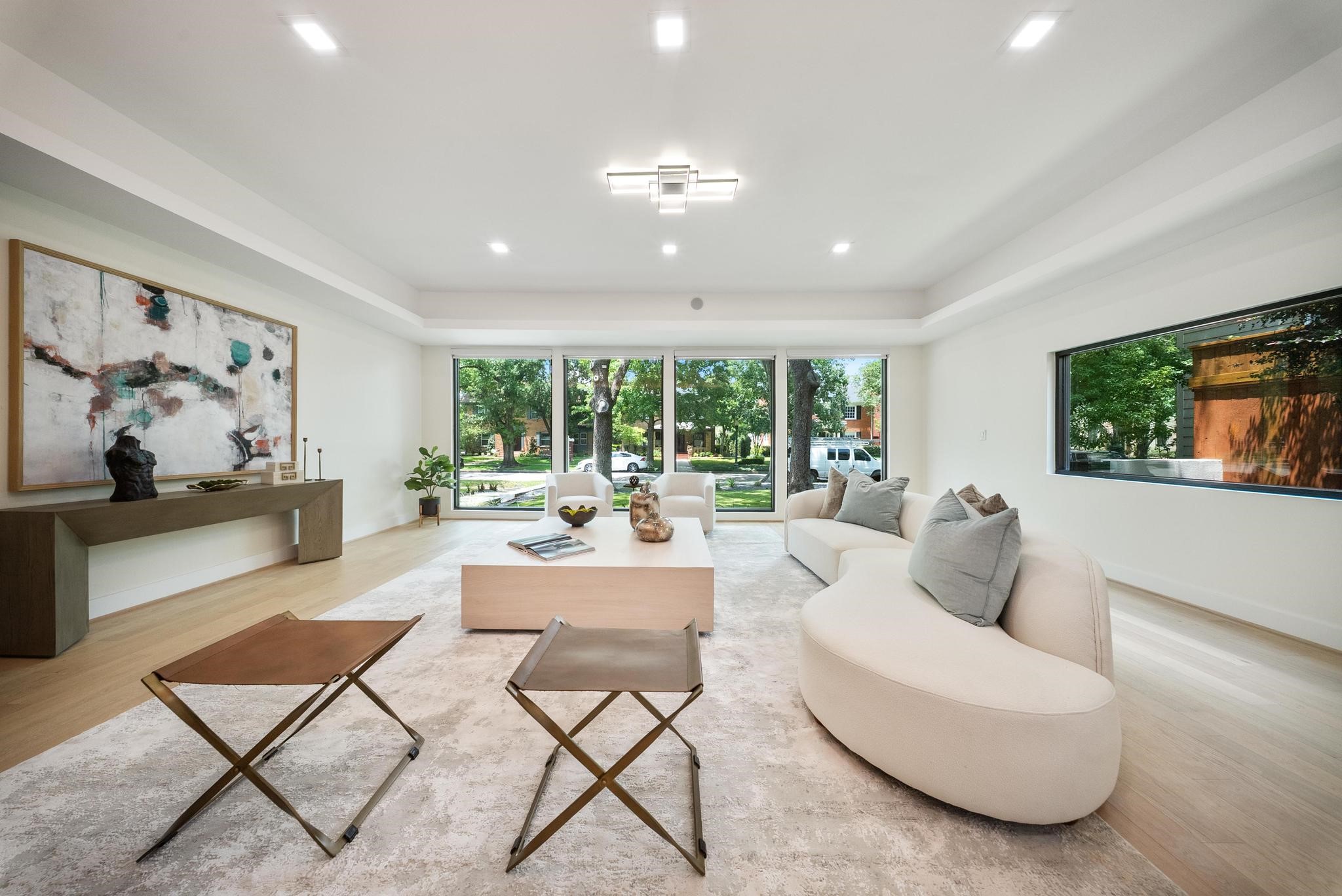 2135 Quenby Street Houston, TX 77005 - Photo 14 of 48 a living room with furniture and a flat screen tv