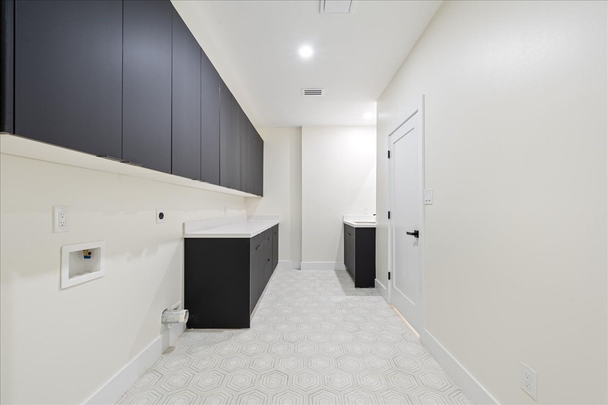 2135 Quenby Street Houston, TX 77005 - Photo 18 of 48 a view of a kitchen with cabinet