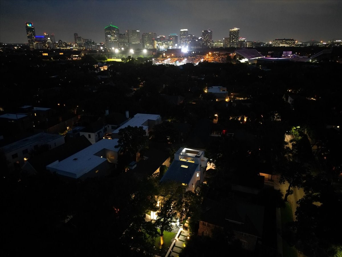 2135 Quenby Street Houston, TX 77005 - Photo 48 of 48 a view of a house and street light and swimming pool