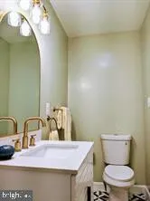 a bathroom with a sink and a toilet