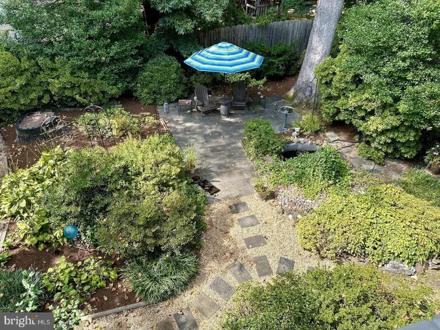 a view of a lawn chair and table in the patio