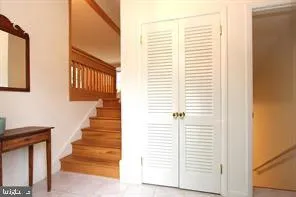 a view of a hallway with stairs