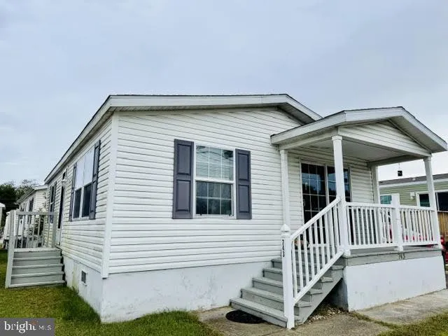 a view of a house with deck and deck