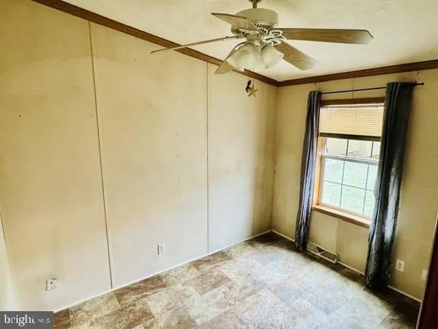 a view of a window in an empty room