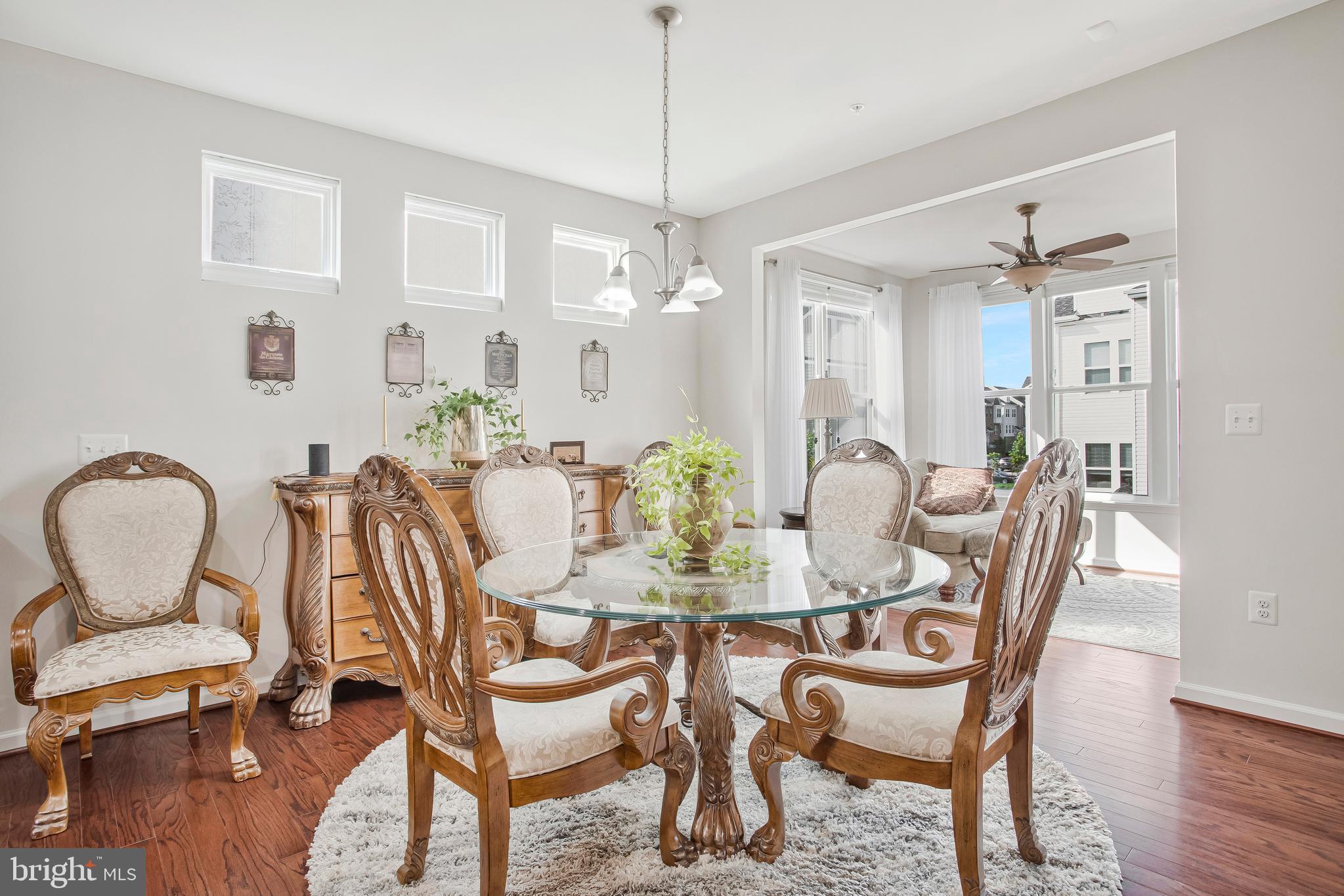 2123 Nottoway Drive Hanover, MD 21076 - Photo 11 of 57 a view of a dining room with furniture window and wooden floor