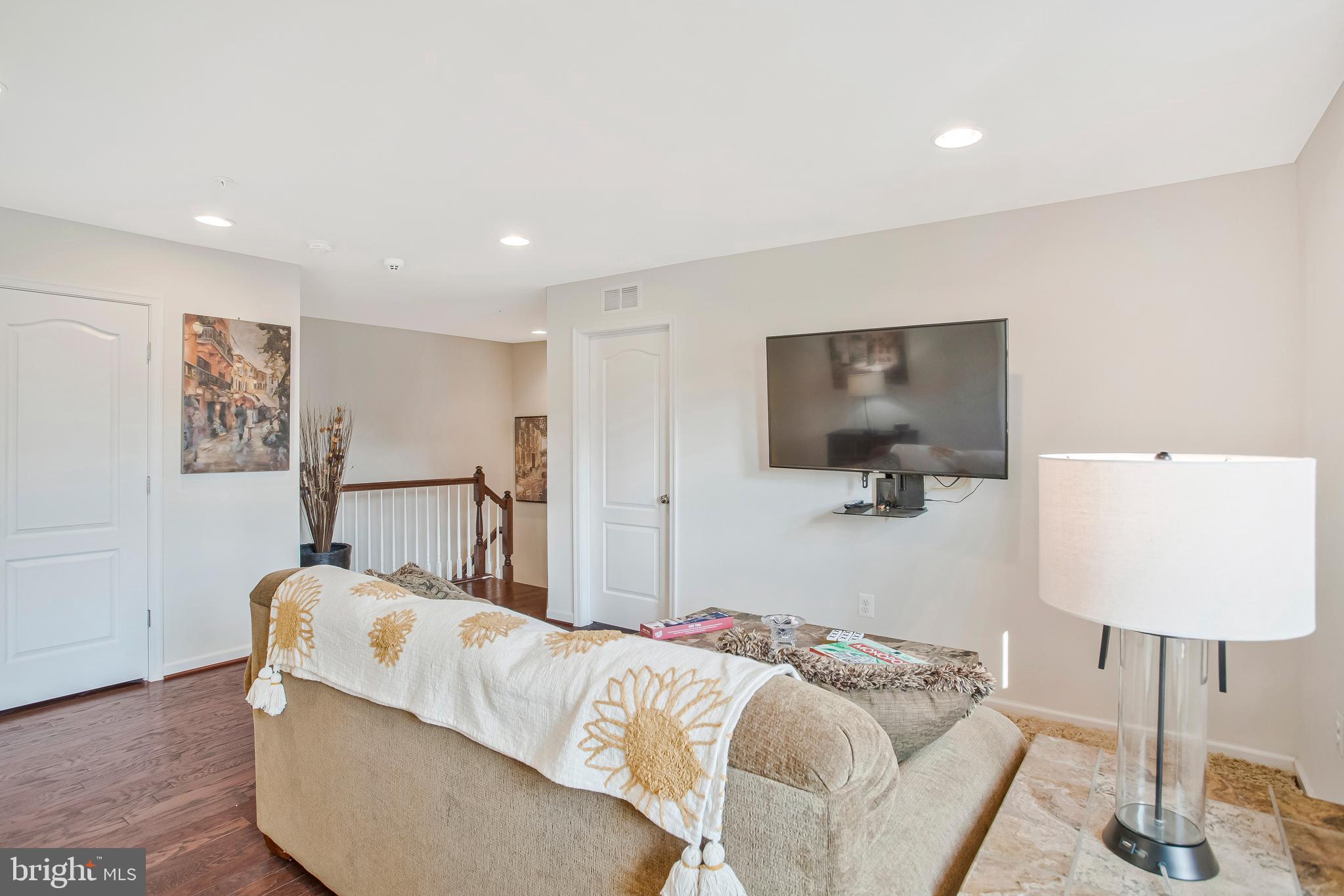 2123 Nottoway Drive Hanover, MD 21076 - Photo 19 of 57 a living room with furniture and a lamp