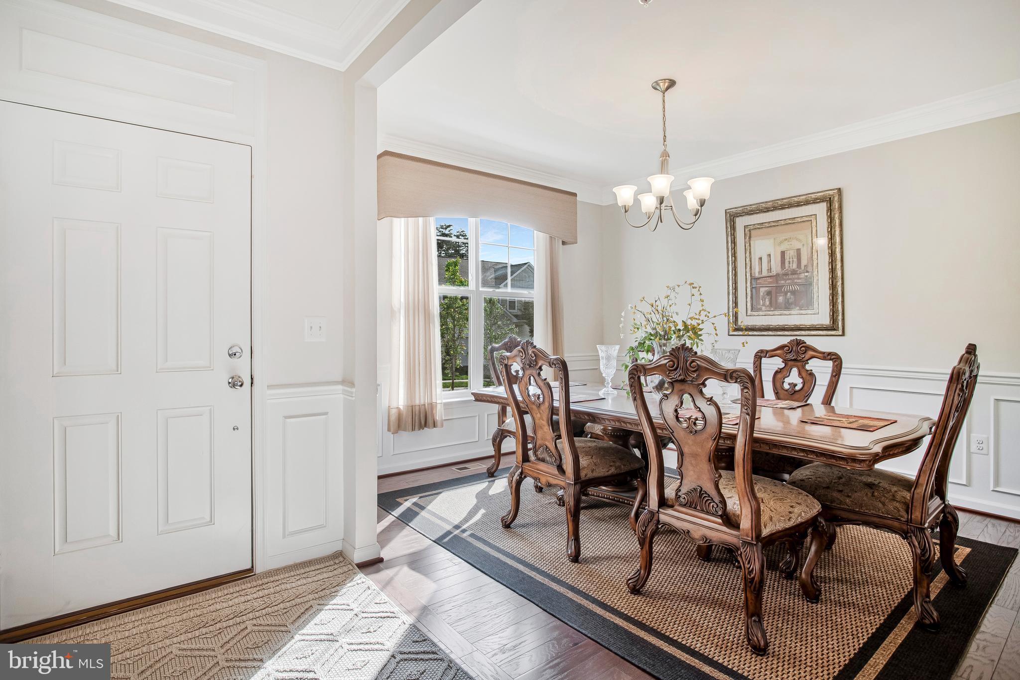 2123 Nottoway Drive Hanover, MD 21076 - Photo 2 of 57 a view of a dining room with furniture window and wooden floor