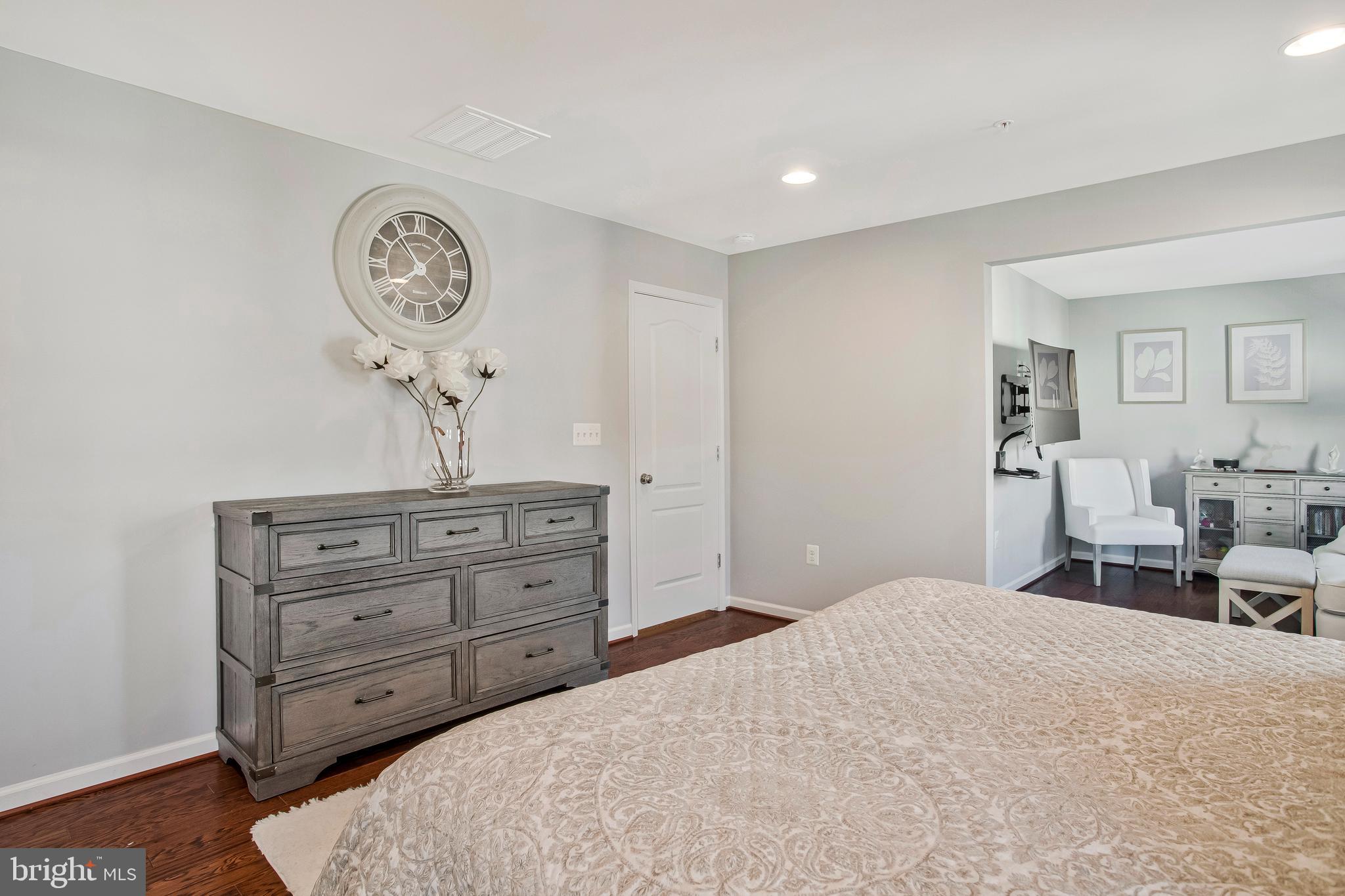 2123 Nottoway Drive Hanover, MD 21076 - Photo 22 of 57 a bedroom with a bed and a dresser