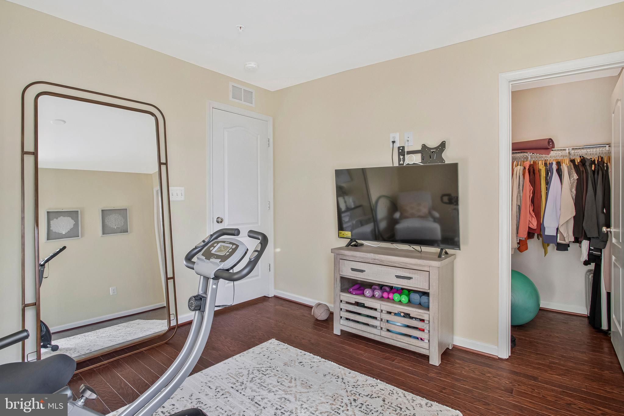 2123 Nottoway Drive Hanover, MD 21076 - Photo 28 of 57 a living room with furniture and a flat screen tv