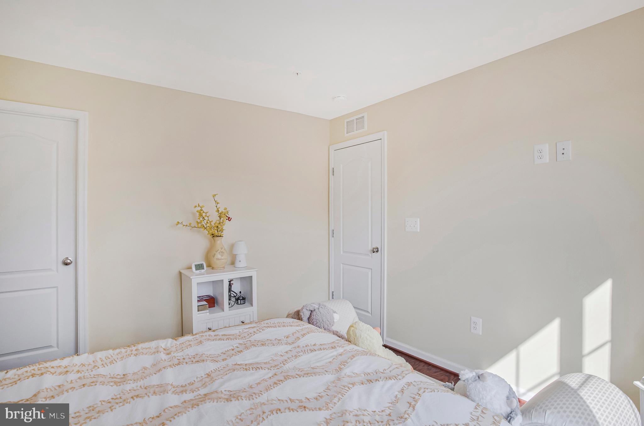 2123 Nottoway Drive Hanover, MD 21076 - Photo 32 of 57 a bedroom with a bed and a window