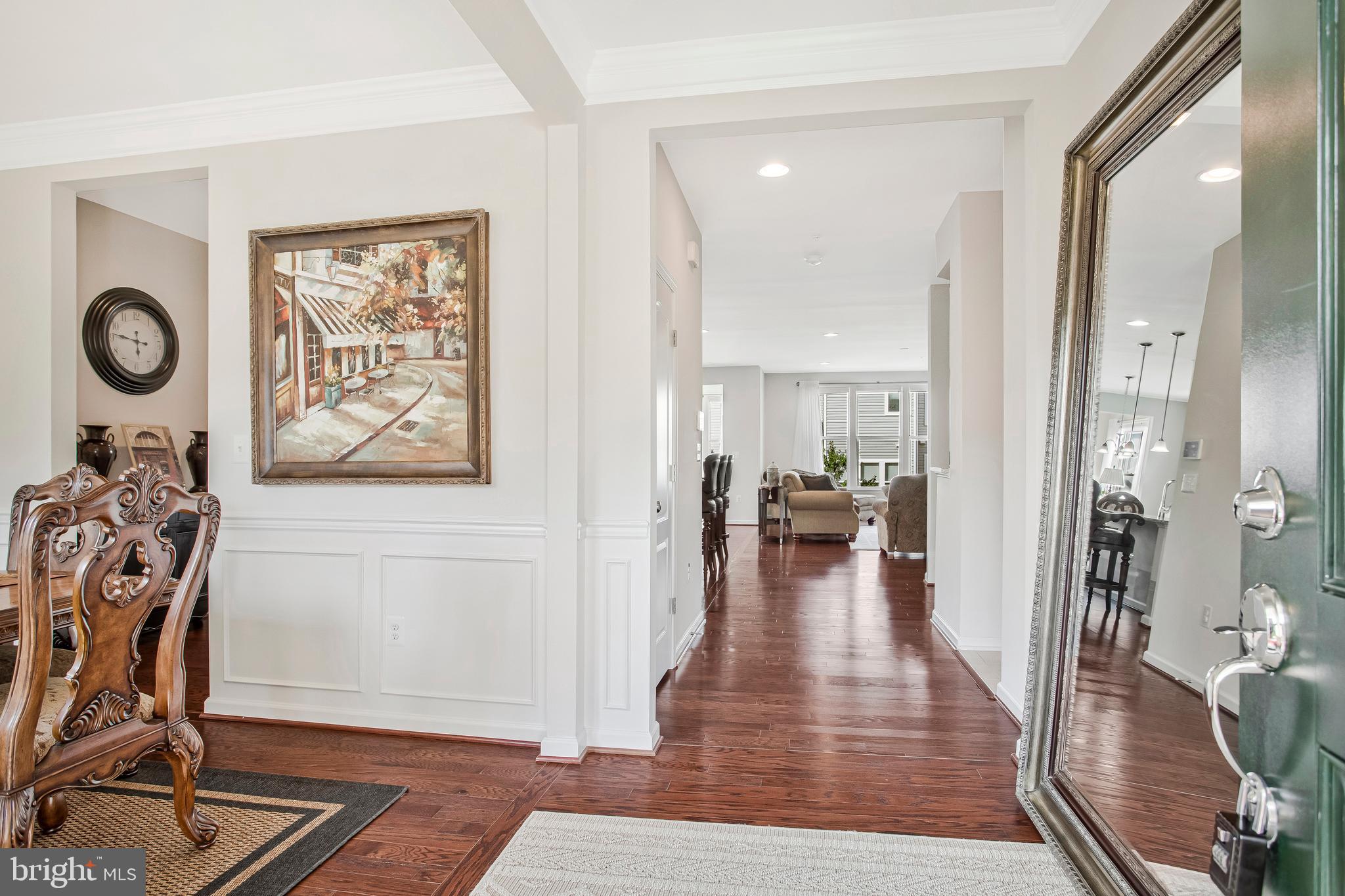2123 Nottoway Drive Hanover, MD 21076 - Photo 5 of 57 a view of a hallway with wooden floor and windows