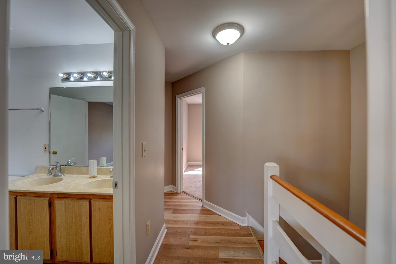 121 Periwinkle Drive Dover, DE 19904 - Photo 18 of 35 a bathroom with a sink and a mirror