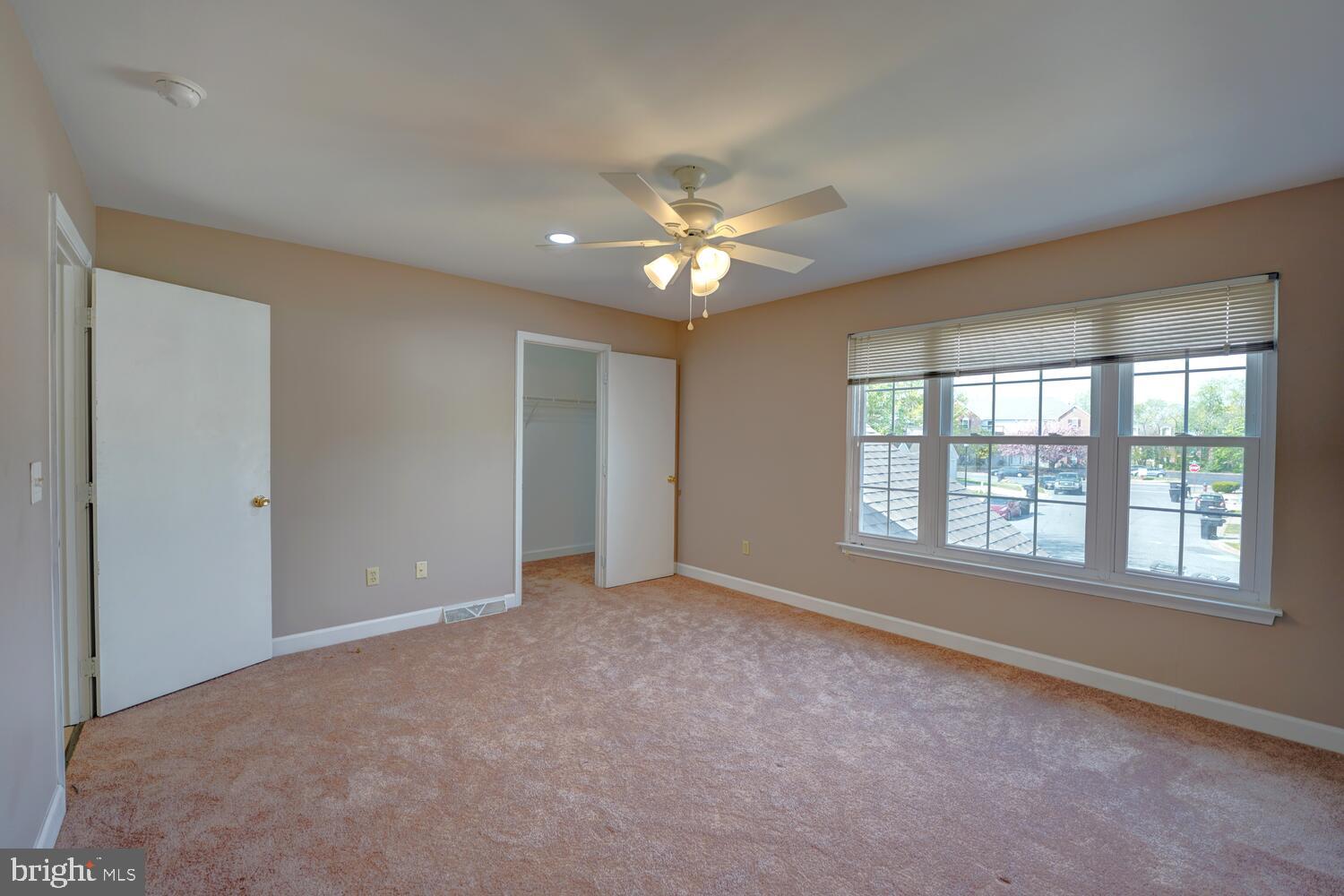 121 Periwinkle Drive Dover, DE 19904 - Photo 22 of 35 a view of an empty room with a window