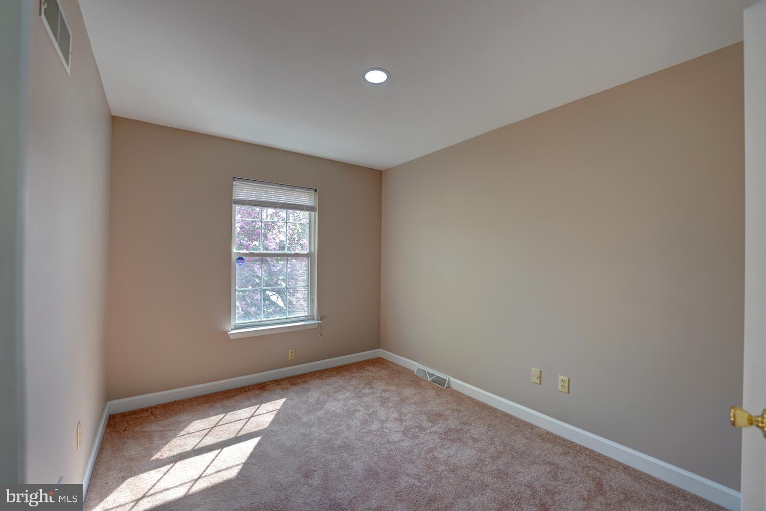 121 Periwinkle Drive Dover, DE 19904 - Photo 27 of 35 an empty room with windows