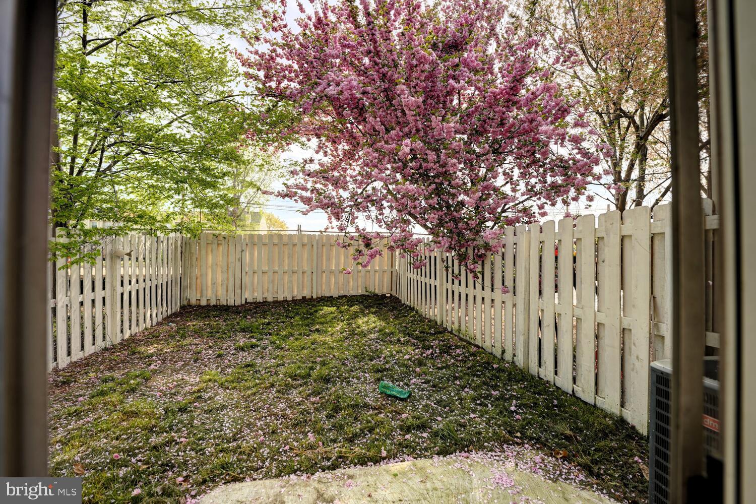 121 Periwinkle Drive Dover, DE 19904 - Photo 29 of 35 a view of a yard with wooden fence