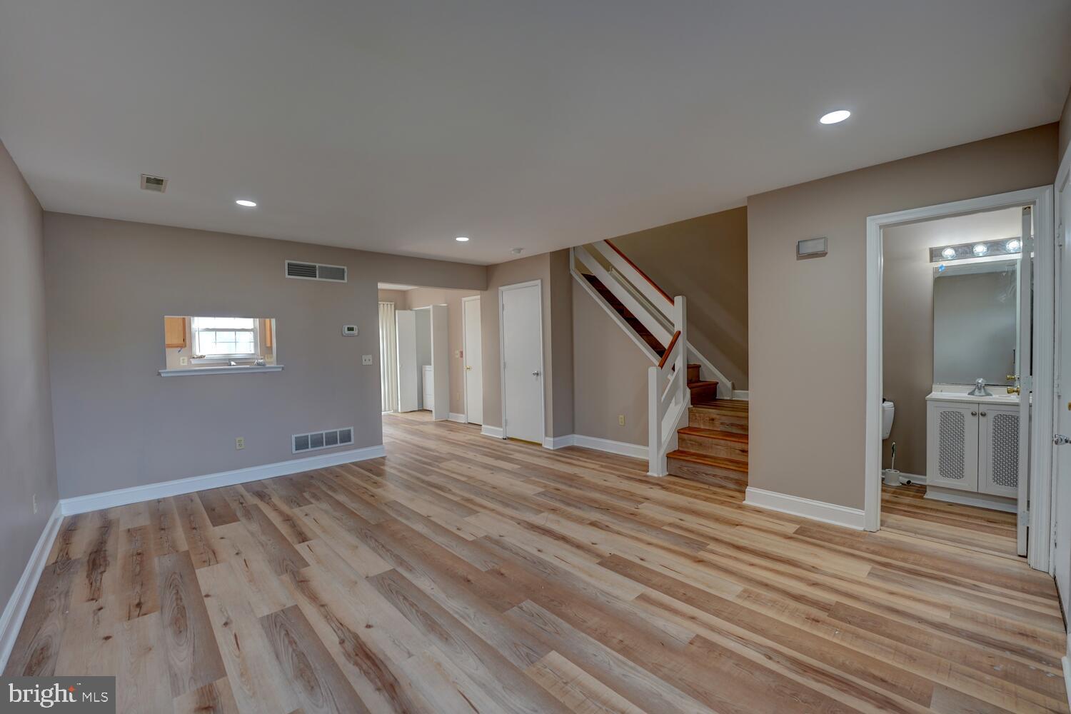 121 Periwinkle Drive Dover, DE 19904 - Photo 3 of 35 a view of empty room with wooden floor