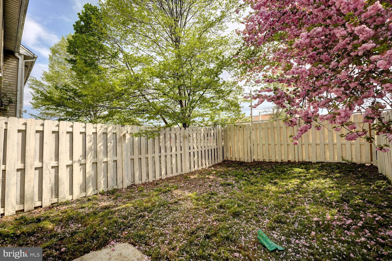 121 Periwinkle Drive Dover, DE 19904 - Photo 32 of 35 a view of a yard with wooden fence