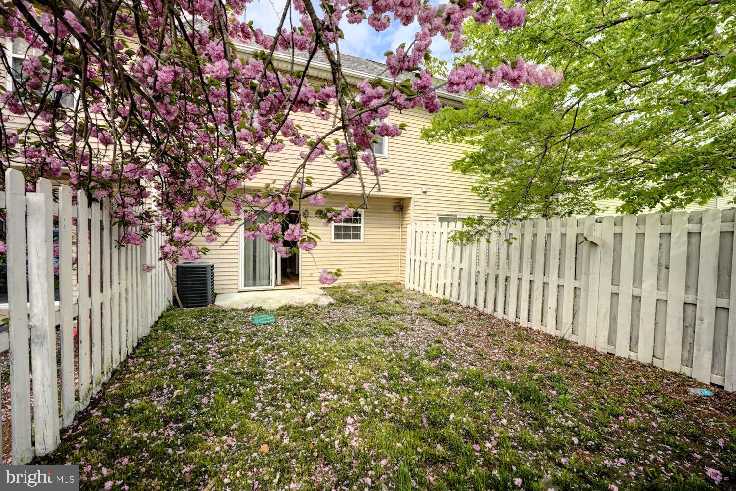 121 Periwinkle Drive Dover, DE 19904 - Photo 34 of 35 a house with a tree in front of it