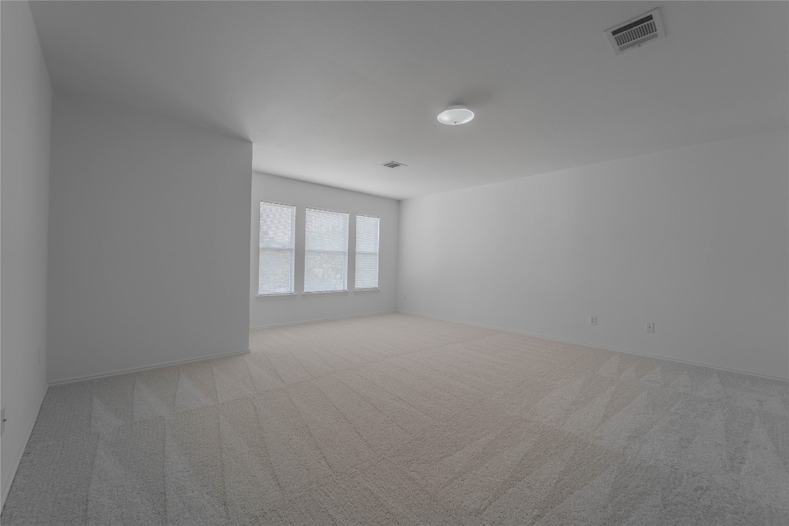 2000 Elk Ridge Cove Round Rock, TX 78665 - Photo 13 of 27 an empty room with windows