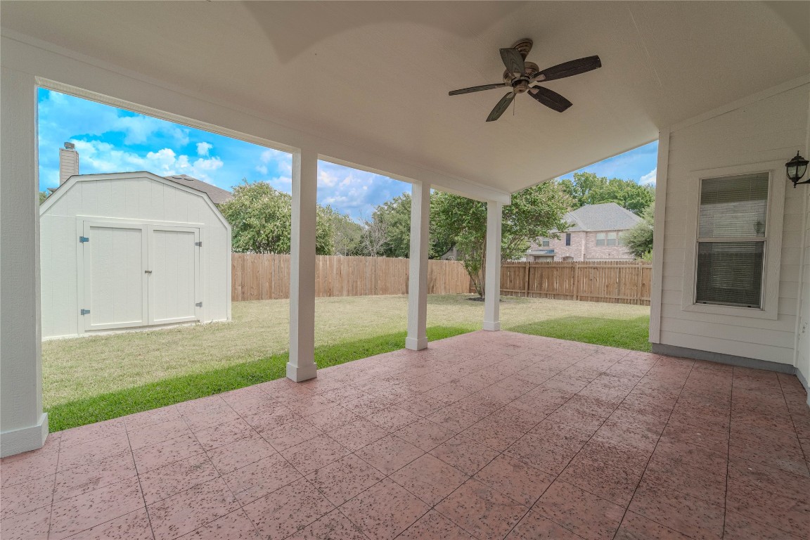 2000 Elk Ridge Cove Round Rock, TX 78665 - Photo 25 of 27 a view of a house with a backyard