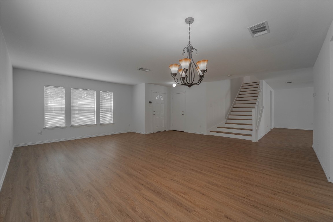 2000 Elk Ridge Cove Round Rock, TX 78665 - Photo 3 of 27 a view of empty room with wooden floor