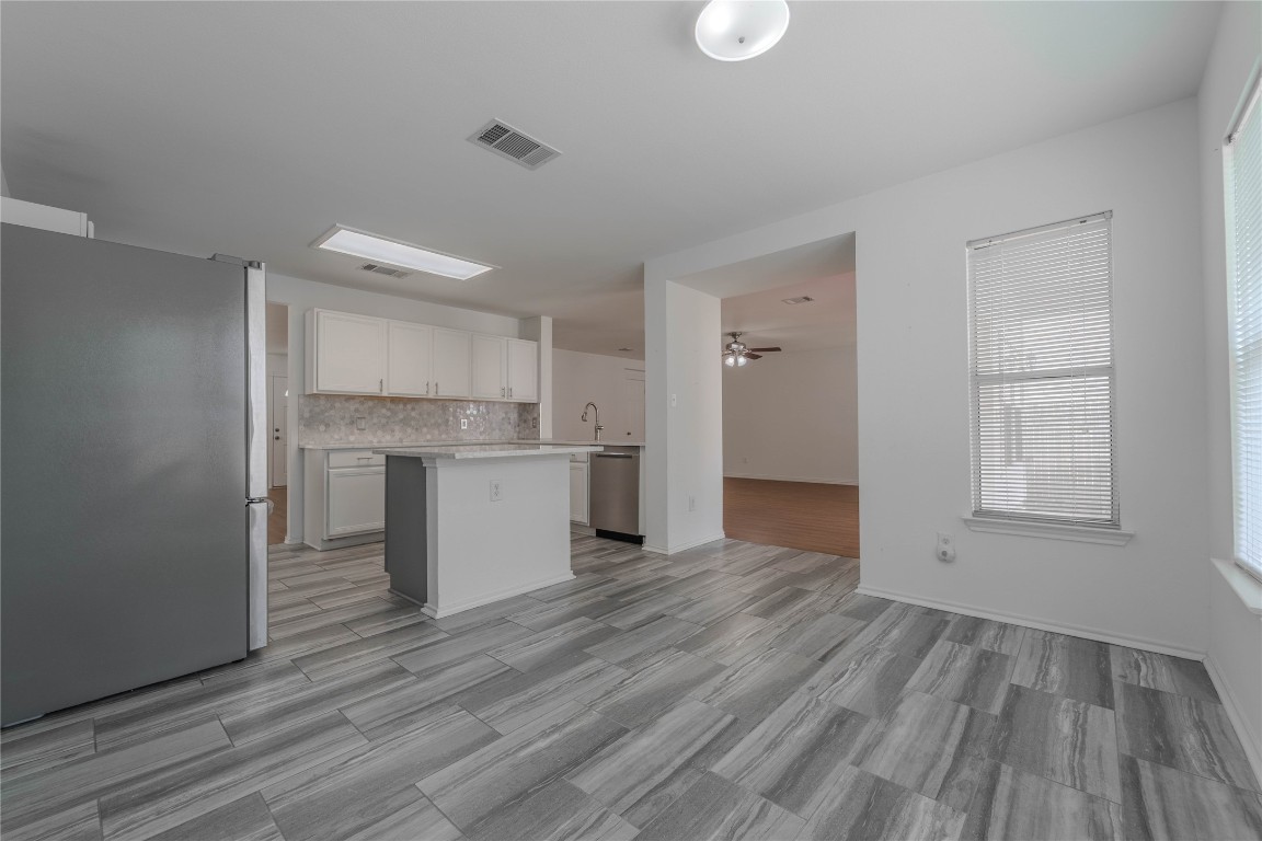 2000 Elk Ridge Cove Round Rock, TX 78665 - Photo 7 of 27 a view of kitchen and wooden floor