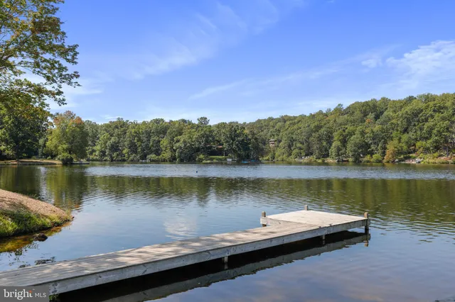 a terrace view with a lake view