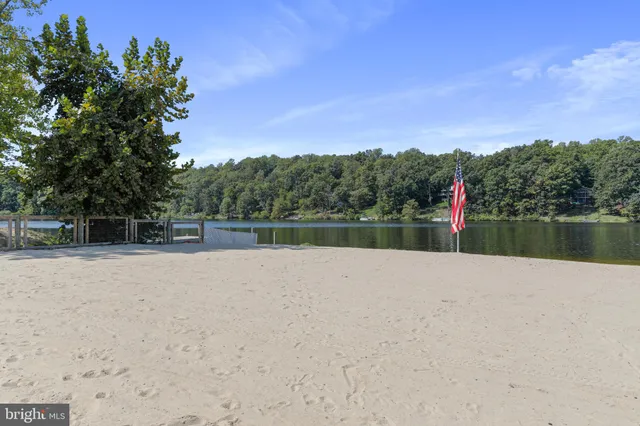 a view of a house with a yard and plants