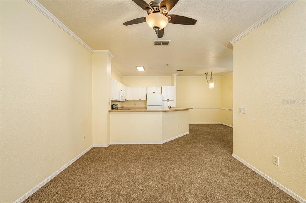 3561 Conroy Road, Unit 215 Orlando, FL 32839 - Photo 16 of 43 a view of a kitchen with a sink and cabinets