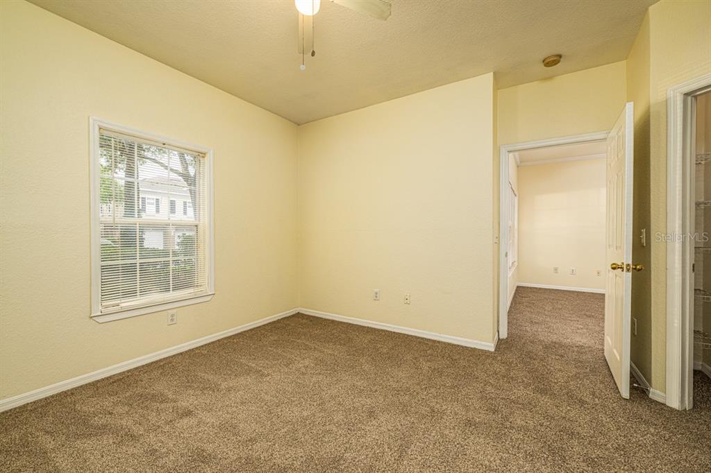 3561 Conroy Road, Unit 215 Orlando, FL 32839 - Photo 21 of 43 an empty room with windows and closet
