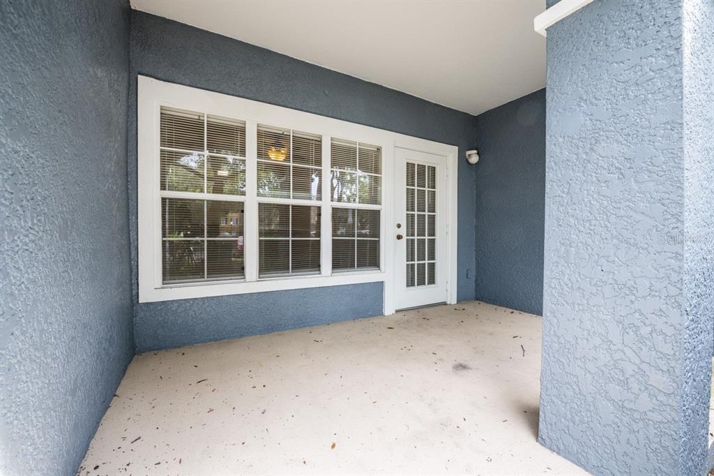 3561 Conroy Road, Unit 215 Orlando, FL 32839 - Photo 30 of 43 a view of empty room with windows