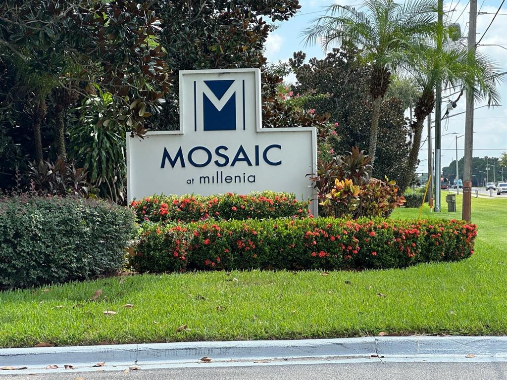 3561 Conroy Road, Unit 215 Orlando, FL 32839 - Photo 3 of 43 a view of sign board with flower garden