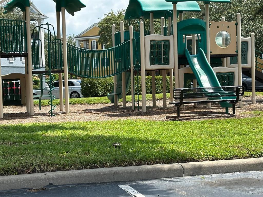 3561 Conroy Road, Unit 215 Orlando, FL 32839 - Photo 34 of 43 a view of a park with slide