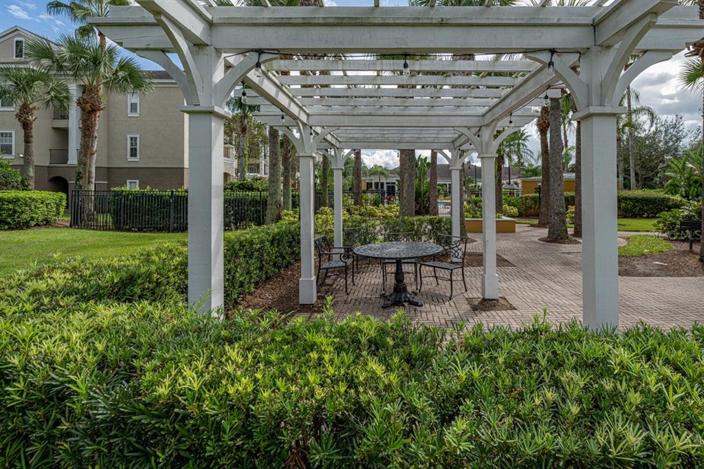 3561 Conroy Road, Unit 215 Orlando, FL 32839 - Photo 39 of 43 a view of a chairs in a patio