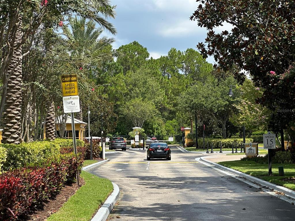 3561 Conroy Road, Unit 215 Orlando, FL 32839 - Photo 42 of 43 a view of parked cars in front of house