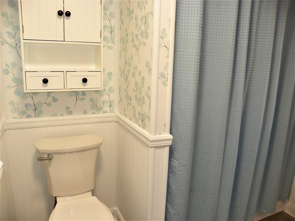 9 Crescent Road Winchendon, MA 01475 - Photo 18 of 23 a bathroom with a sink a toilet and a mirror