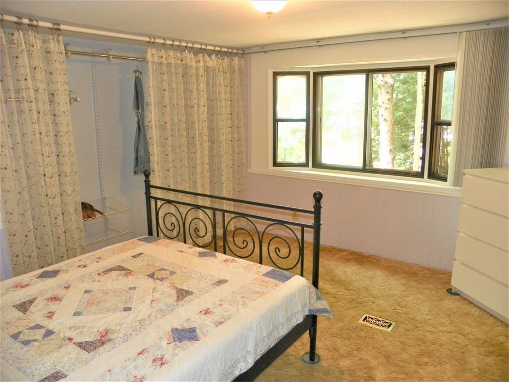 9 Crescent Road Winchendon, MA 01475 - Photo 19 of 23 a bedroom with a bed and a window