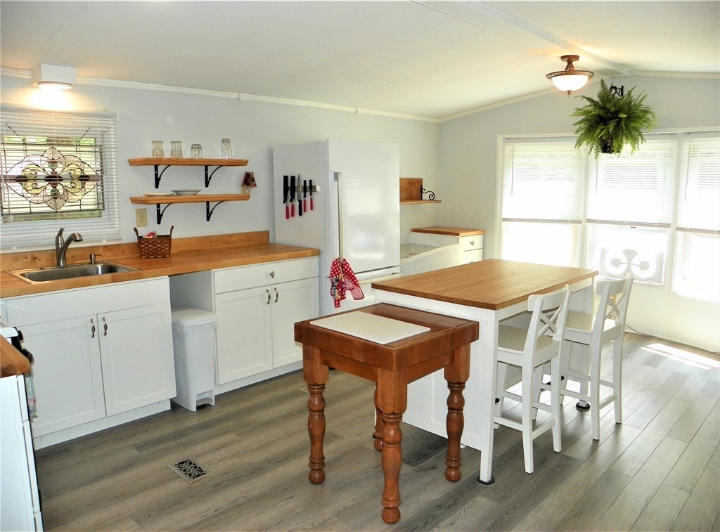 9 Crescent Road Winchendon, MA 01475 - Photo 6 of 23 a dining room with furniture and wooden floor