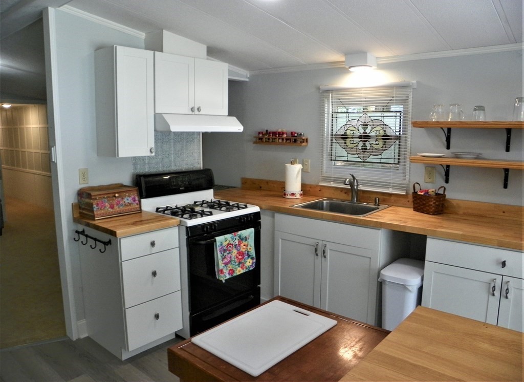 9 Crescent Road Winchendon, MA 01475 - Photo 7 of 23 a kitchen with a cabinets and window