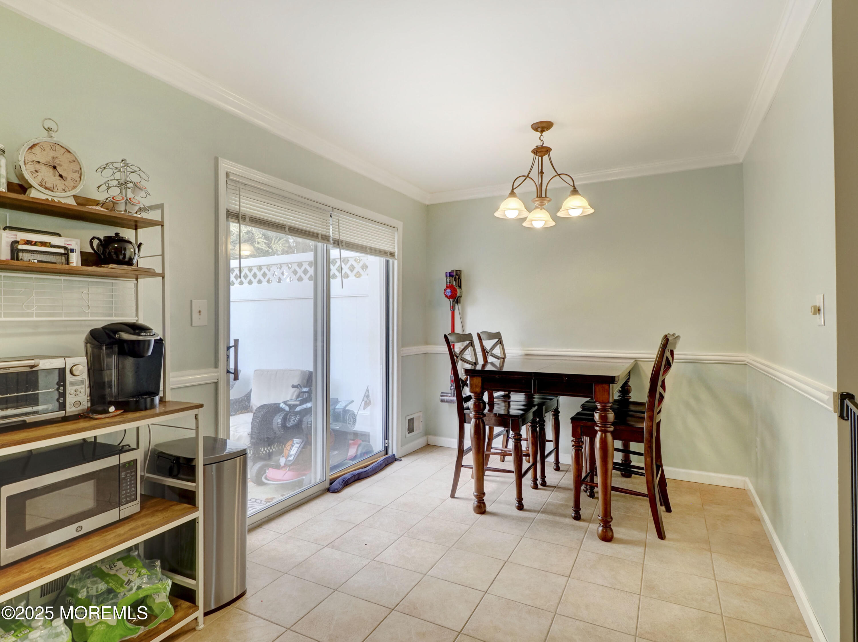 82 Cliffwood Avenue West, Unit 25D Cliffwood, NJ 07721 - Photo 18 of 27 a dining room with furniture and window