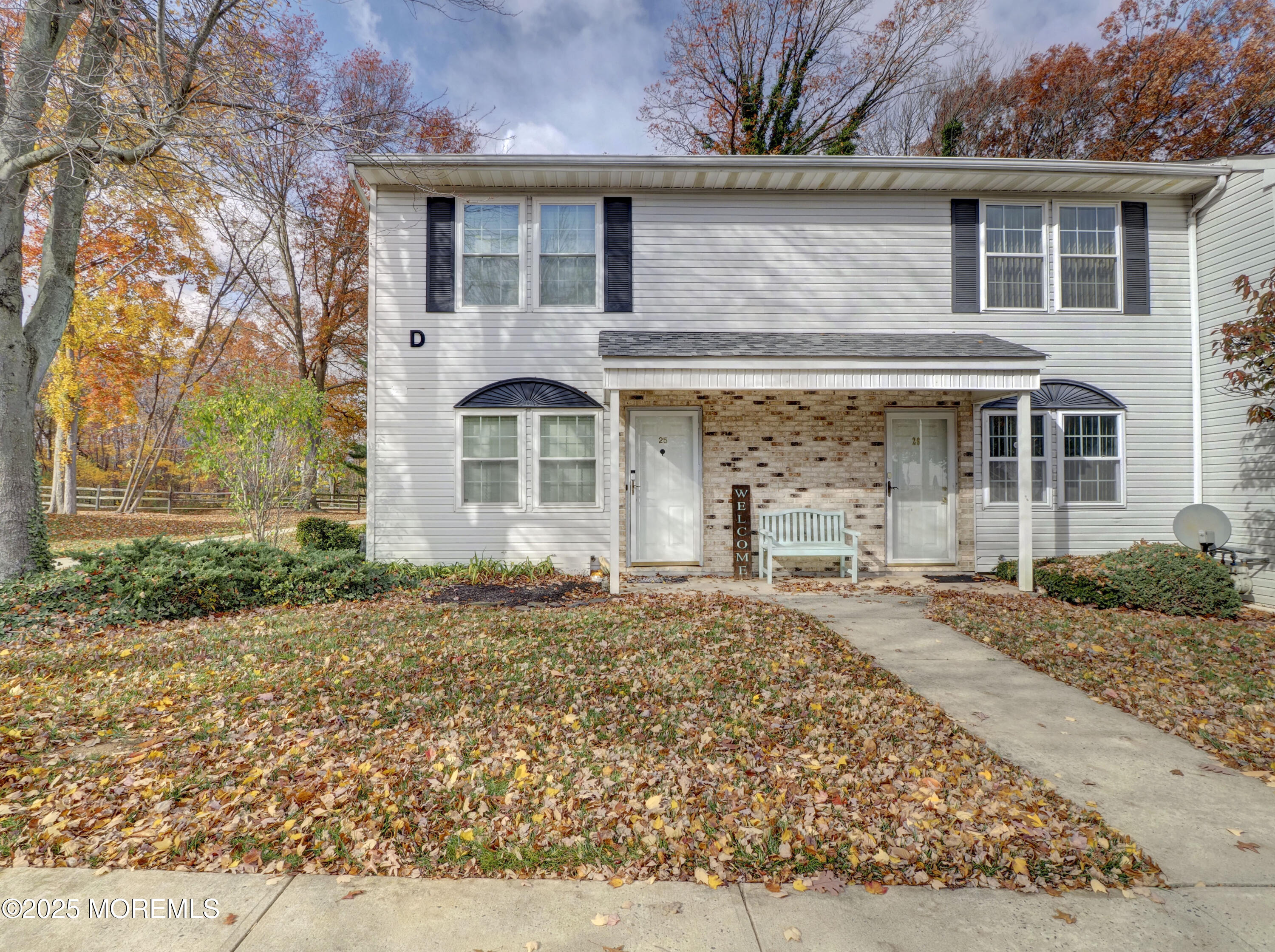 82 Cliffwood Avenue West, Unit 25D Cliffwood, NJ 07721 - Photo 2 of 27 front view of a house with a dry yard