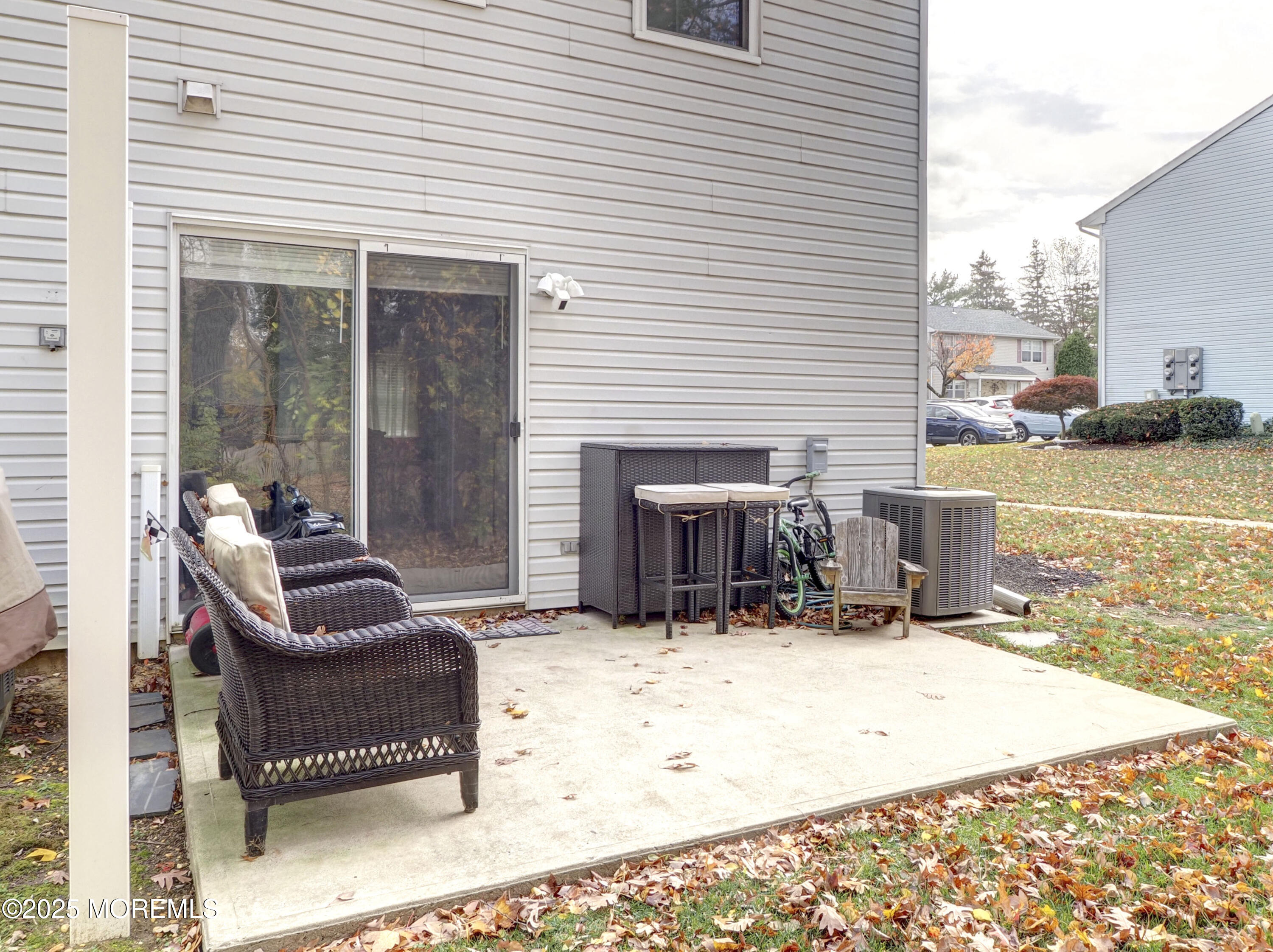 82 Cliffwood Avenue West, Unit 25D Cliffwood, NJ 07721 - Photo 21 of 27 a view of a patio with couches chairs and a fire pit